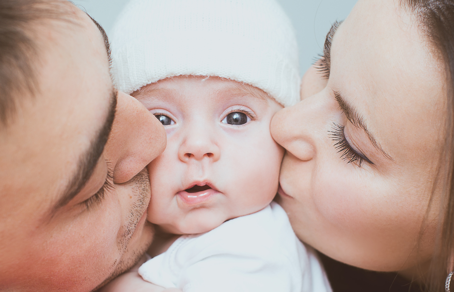 Symbolfoto Eltern mit Kind