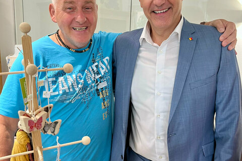 LR Schneemann zu Besuch in neuer Behindertenförderung Neusiedl am See