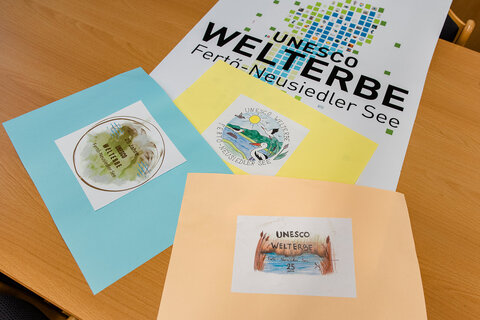 Die drei Preisträger-Logos für das Jubiläumslogo für das Welterbe Neusiedler See.